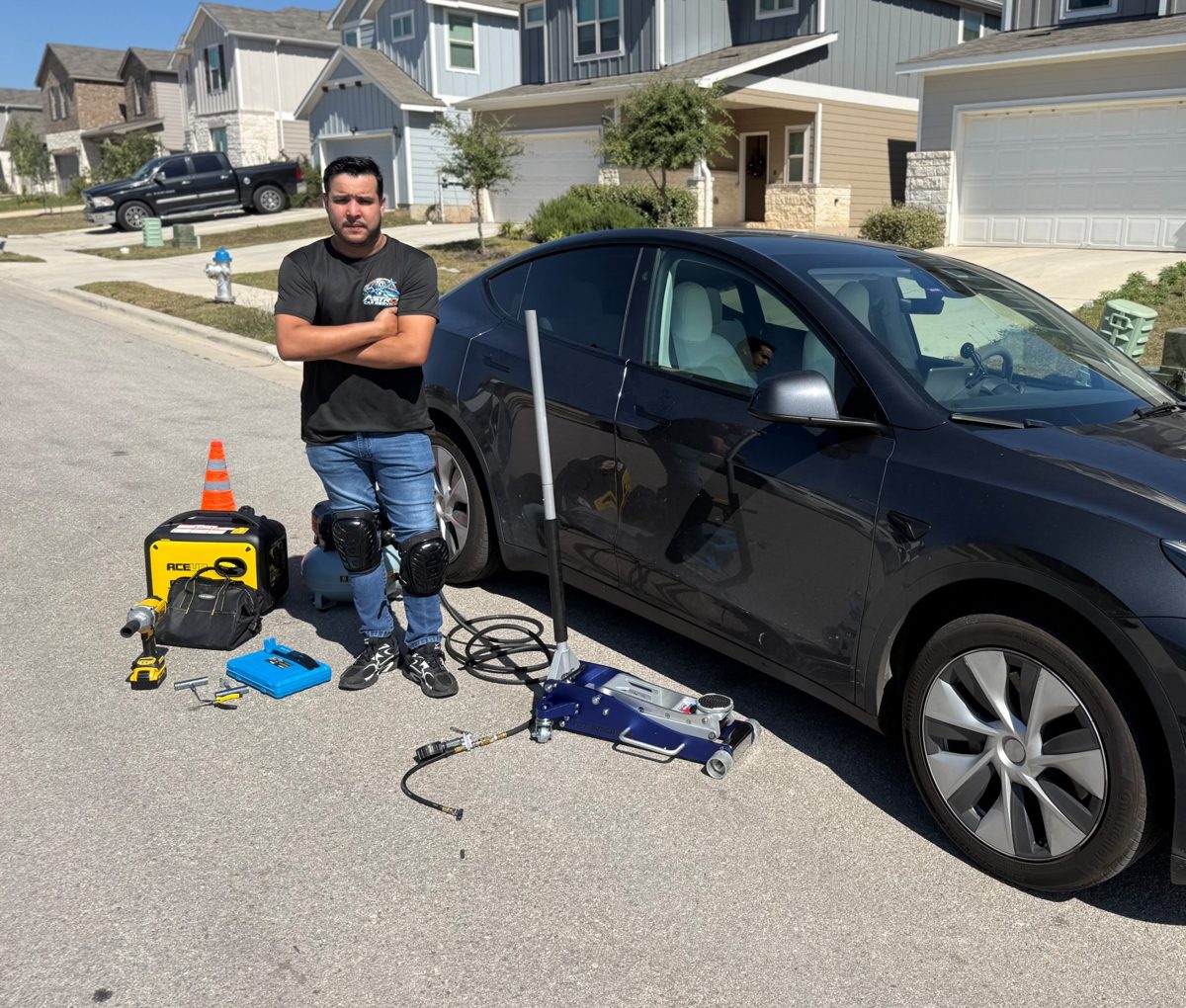 Astro Roadside technician with service vehicle and tools