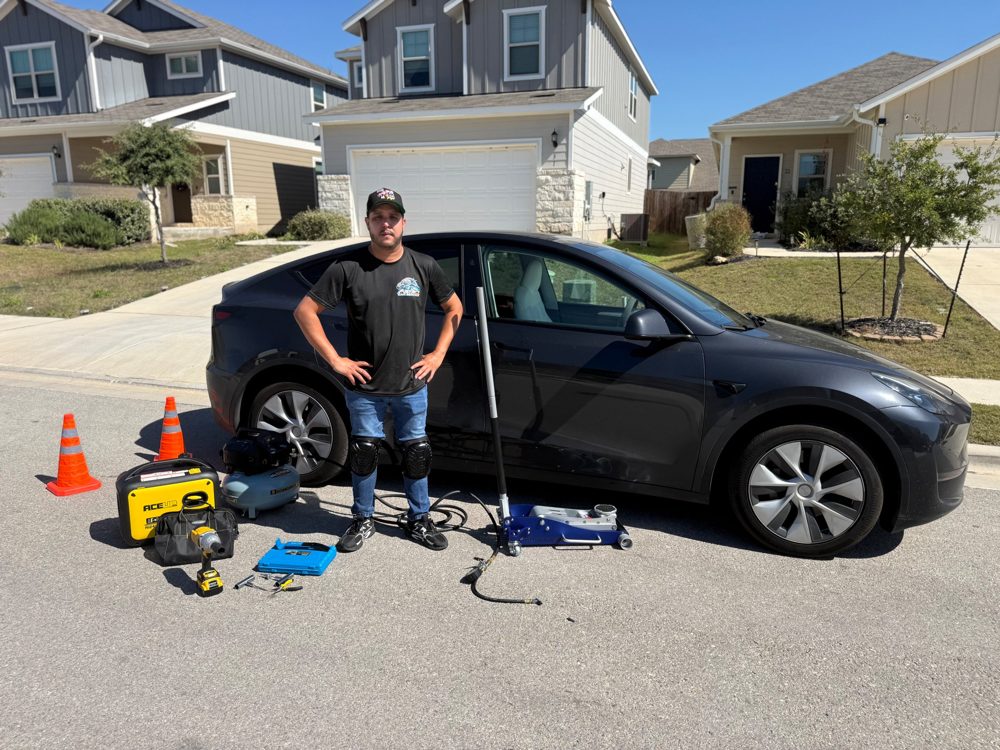 Technician with roadside equipment