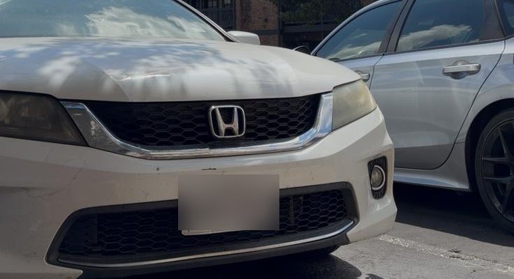 Yellowed, oxidized headlights before restoration